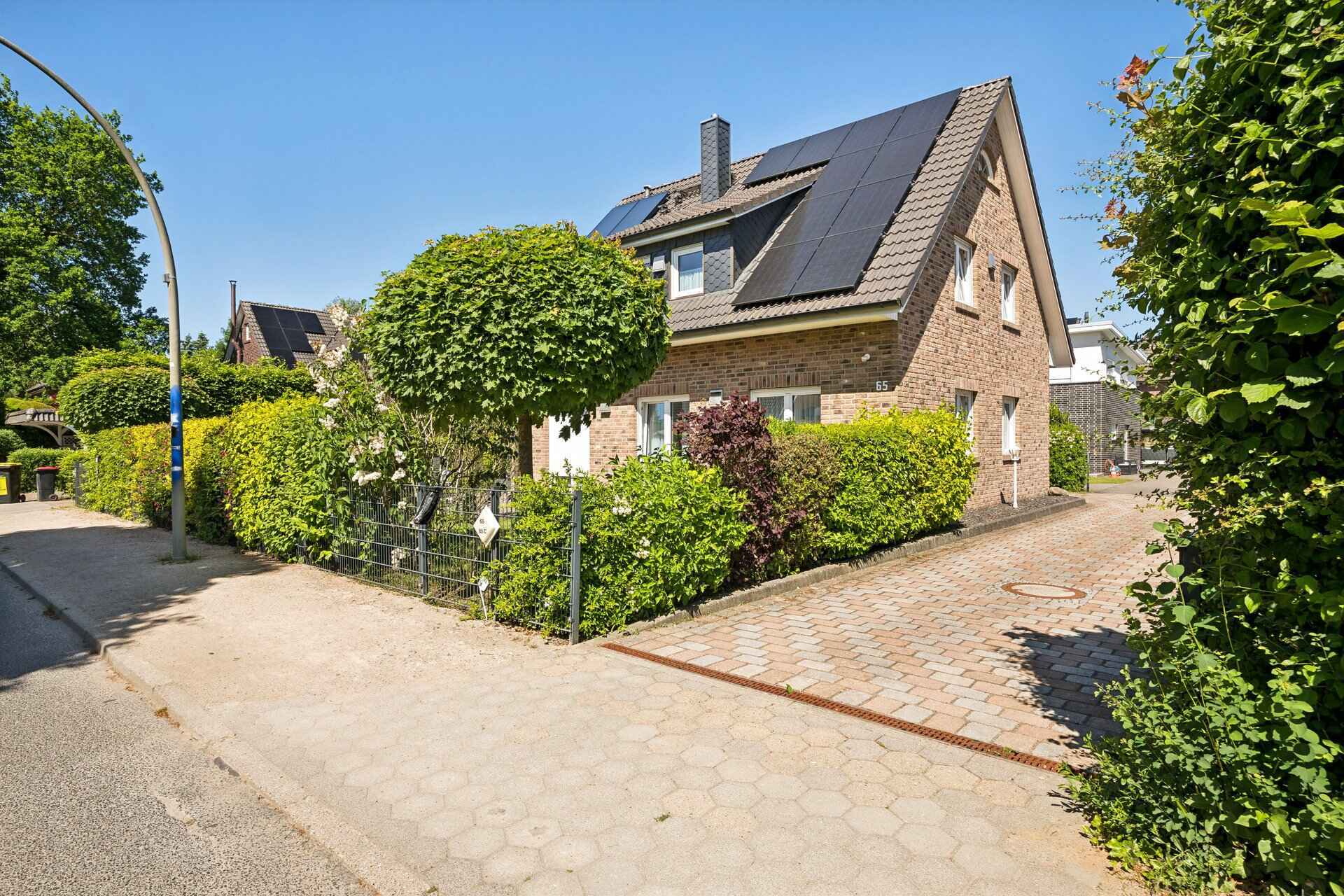 Immobilienangebot - Hamburg / Sasel - Alle - Modernes Einfamilienhaus in Hamburg-Sasel – Kamin, Garten & Top-Energieeffizienz